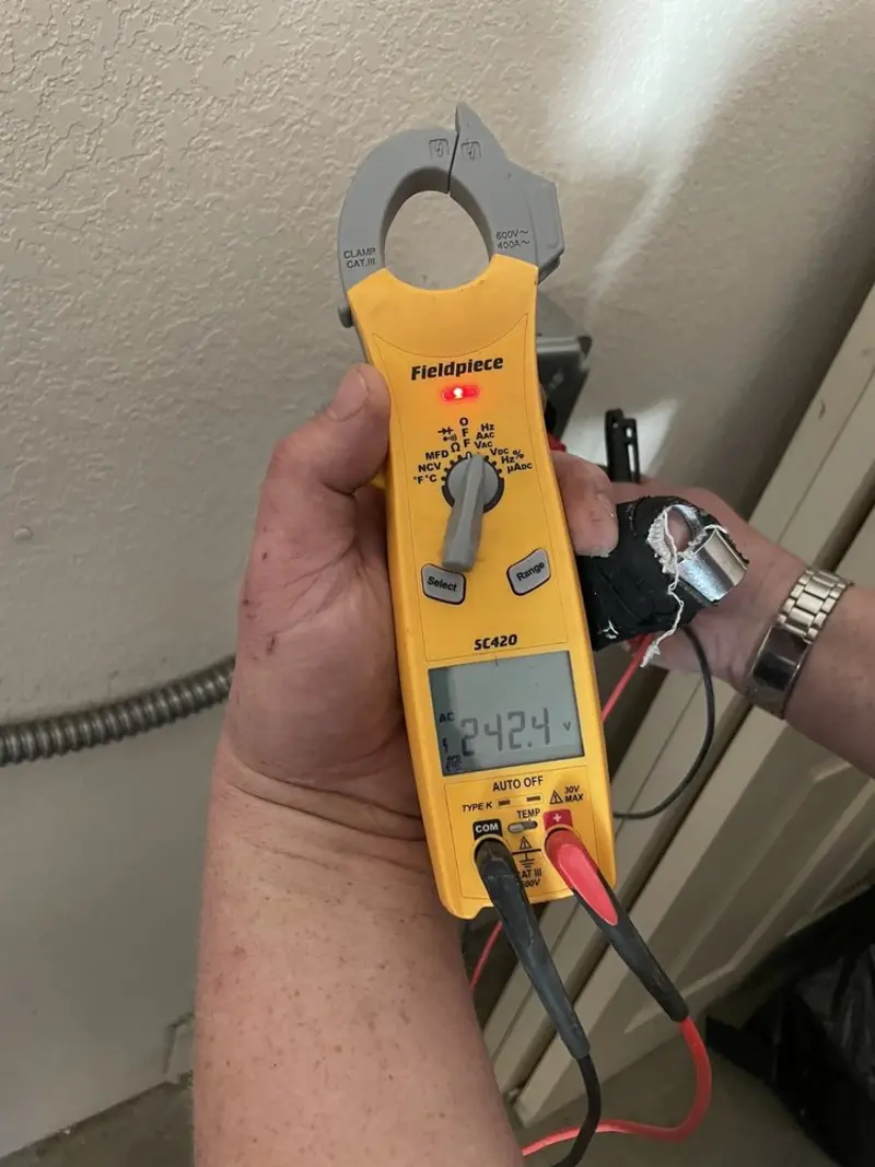 Voltage testing with clamp meter during Aluminum Wiring Replacement in Hope